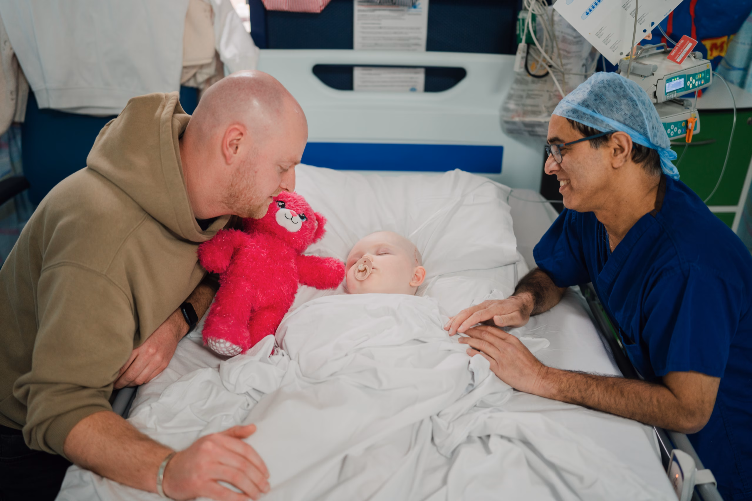 consultant with patient and parent at BCH