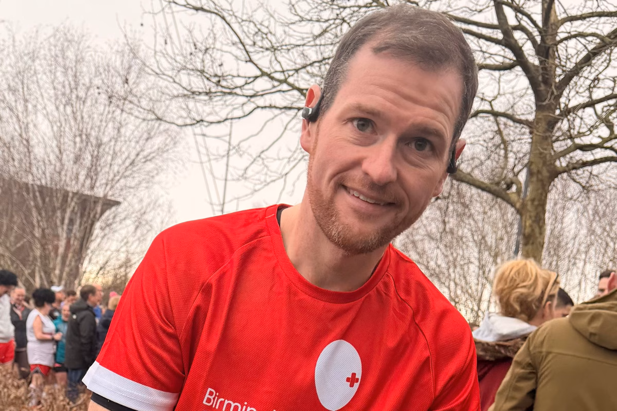 Rhys Ford in red charity running top