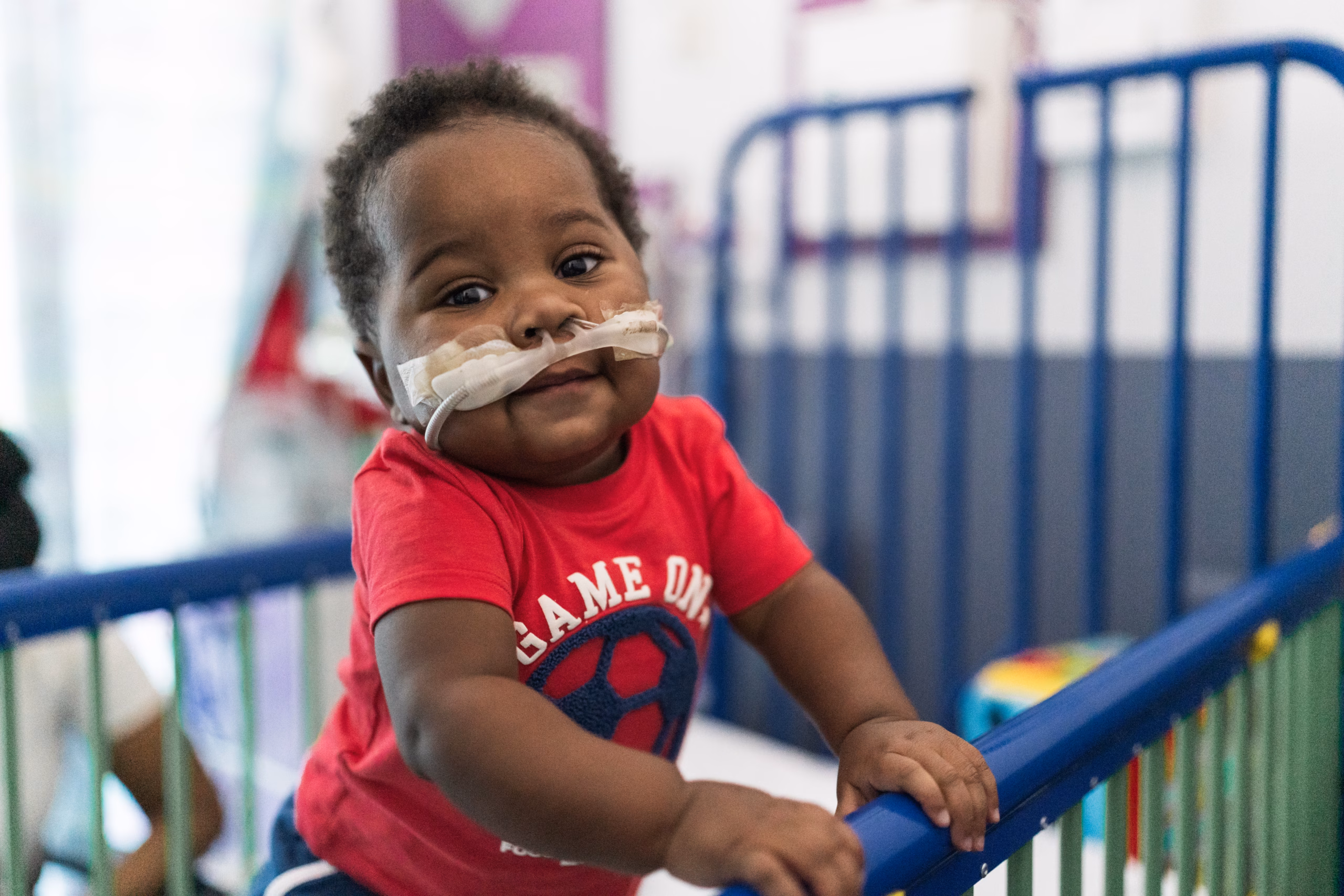 patient in our hospital in a toddler cot