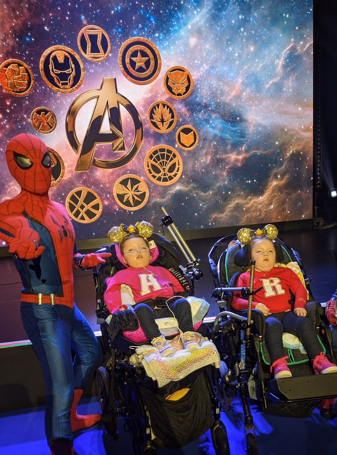 Twin girls in buddies with Disney and Marvel characters