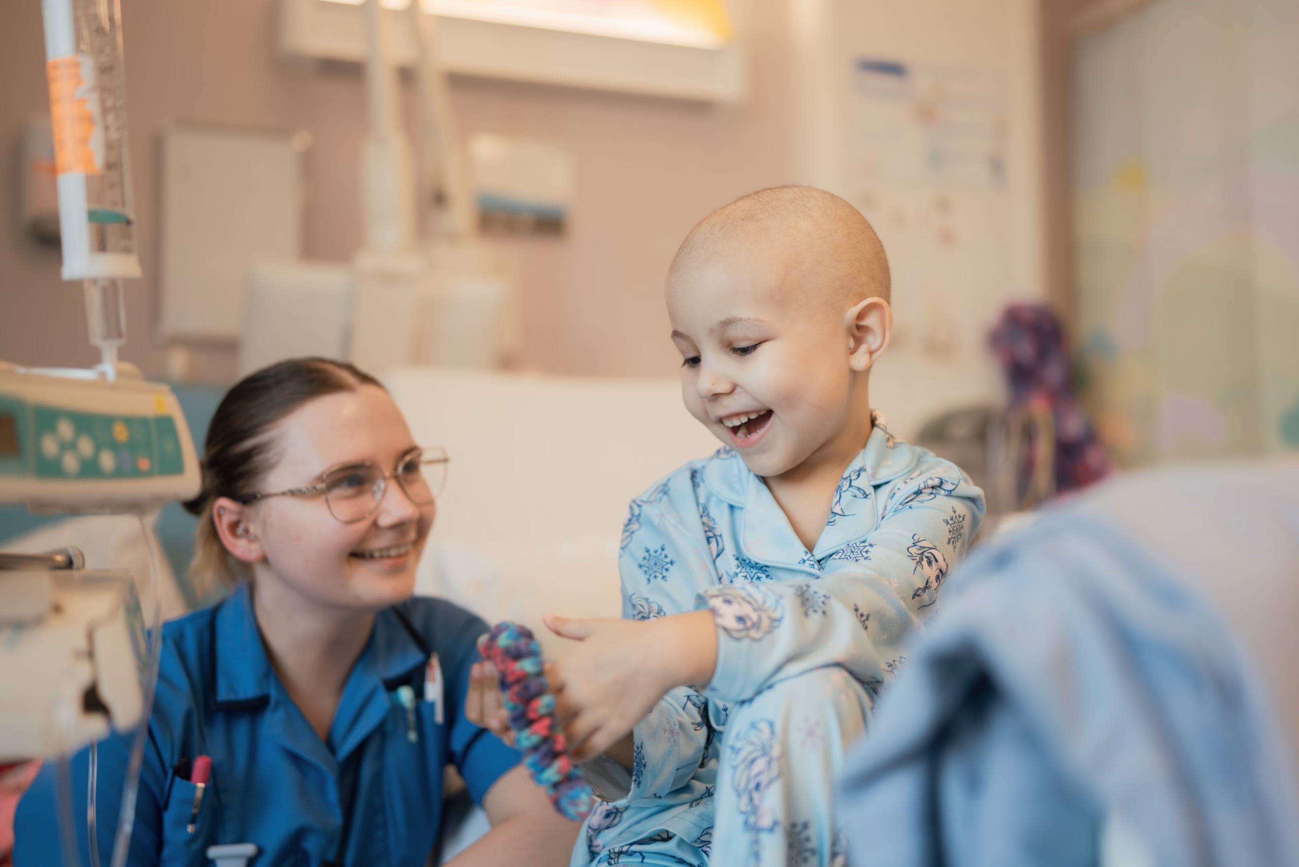 cancer patient with nurse on the ward