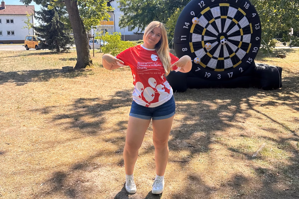 Woman in red charity t shirt