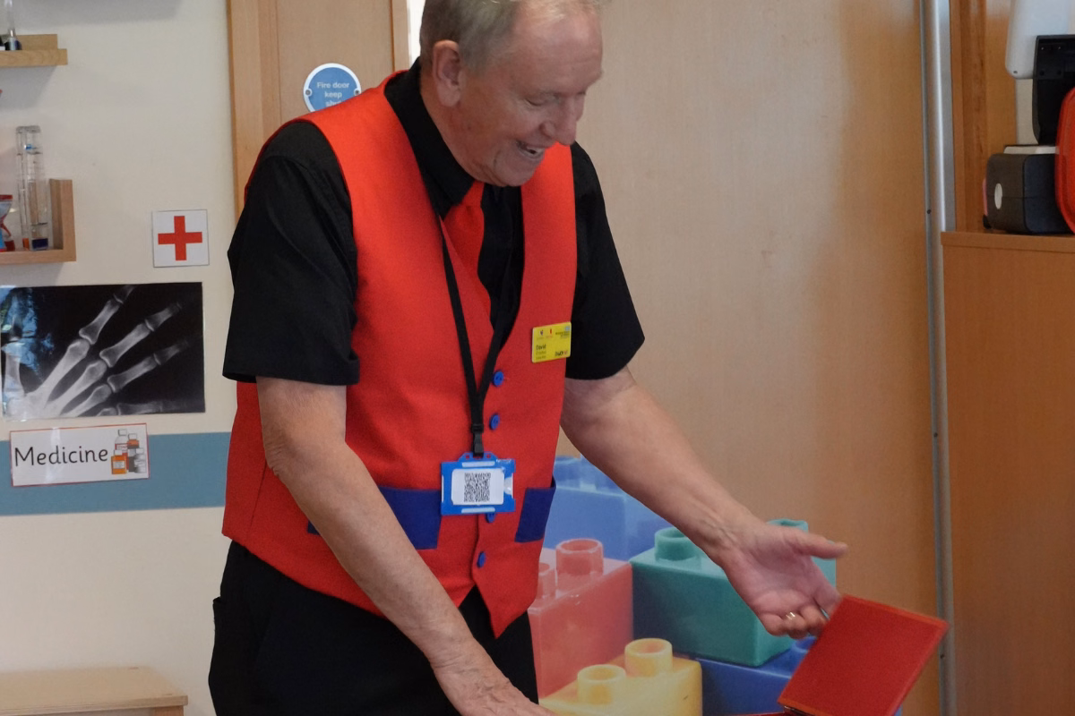 Man in high vis opening magic box