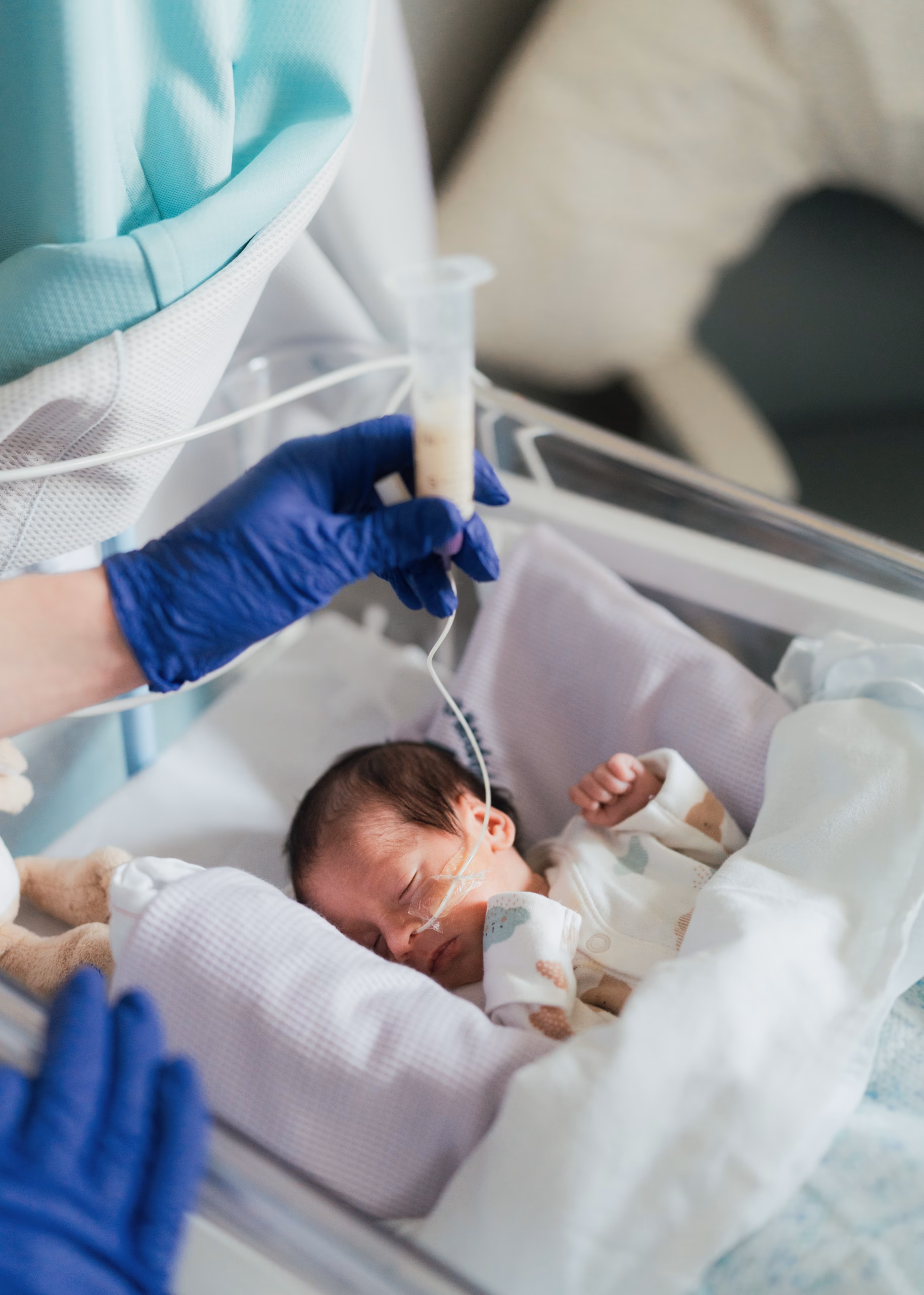 new born baby with feeding tube