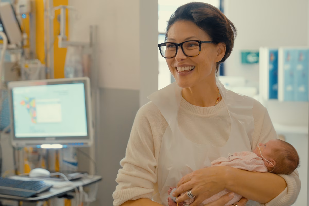 Emma Willis holding baby